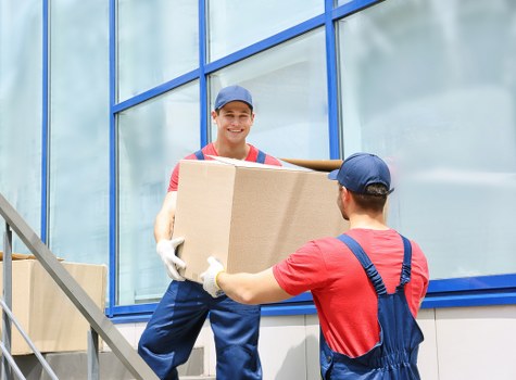 Man and van service terms with moving vehicle and boxes