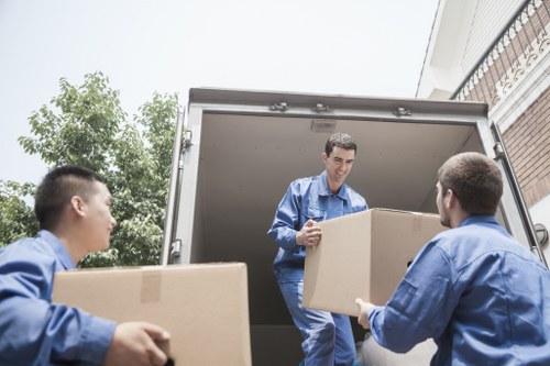 Staff member checking packing and handling practices