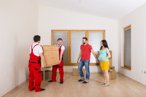 Careful handling of bulky items by a man and van team