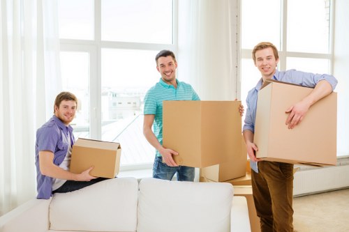Unpacking assistance in Tufnellpark helping organize household items efficiently