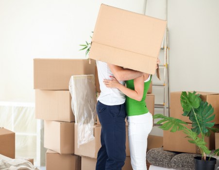 Local removal team handling furniture move in a Tufnellpark street