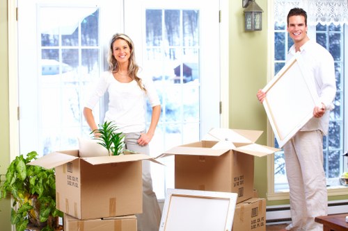 Packed moving boxes inside a Tufnellpark removal van